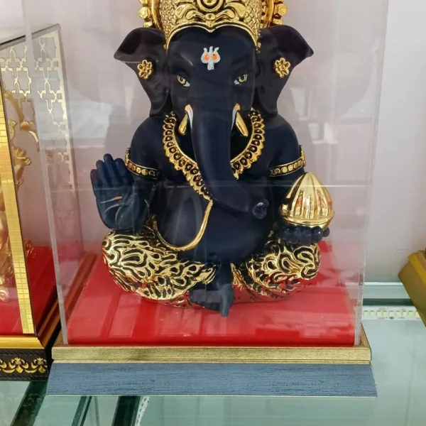 999 silver crafted deep blue and gold ganesh Idol highly detailed golden floral brocade patterns